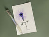 Watercolor painting of a transparent purple anemone flower with pen